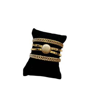 Thick combined gold toned fashion cuff bracelet